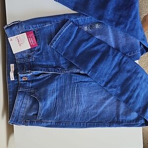 Blue stretchy denim leggings pants.